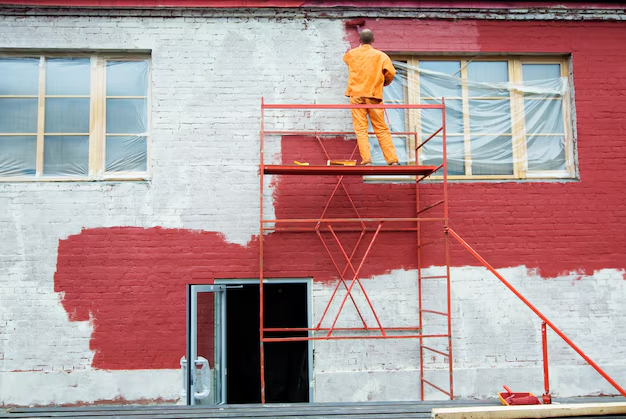 pintor-de-jaen-aplicando-revestimiento-rojo